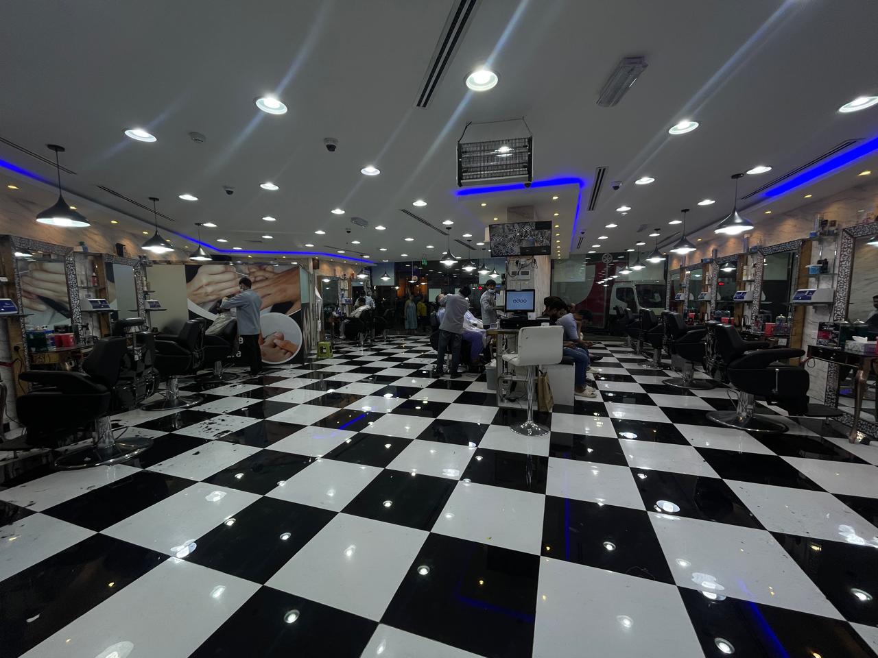 Running Gents saloon for sale at crowded location